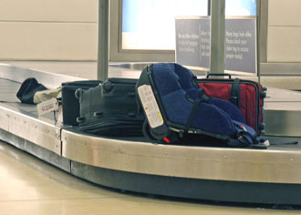 Luggage on airport conveyor belt